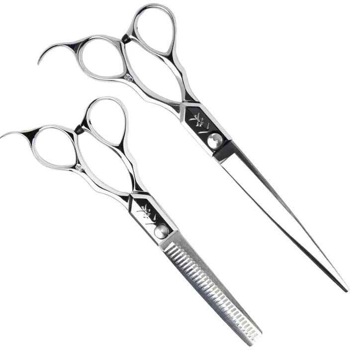 Yasaka barber set: a long cutting scissor beside a thinning scissor.
